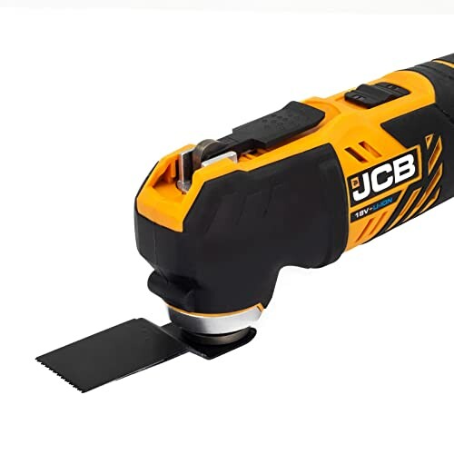 JCB multi-tool with blade attachment